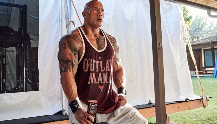 Dwayne The Rock Johnson having a ZOA drink after a workout